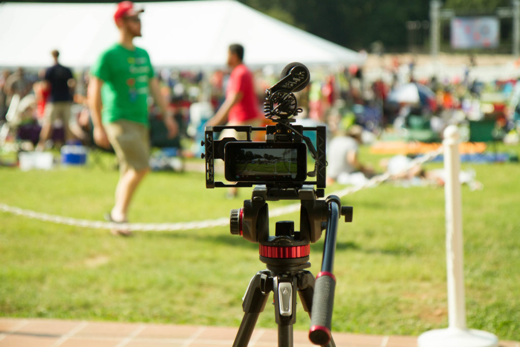 The iPhone gear setup on a tripod to shoot high-quality video. | Polymath Innovations